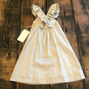 Sweet Cottontail grey dress with cross back neck.